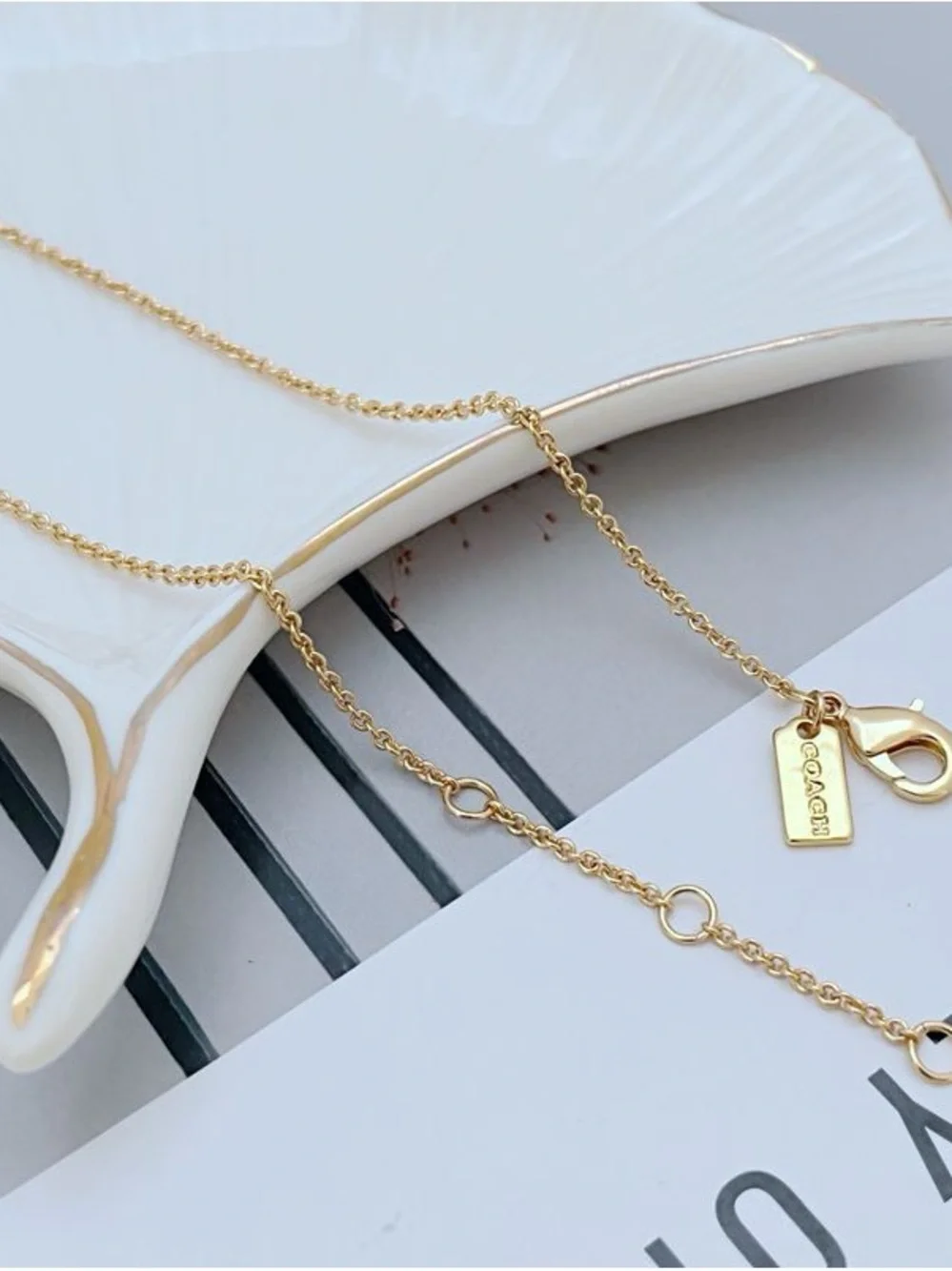 Coach Gold-Tone Bar Necklace with Crystal and Pearl Accents - Picture 5 of 5